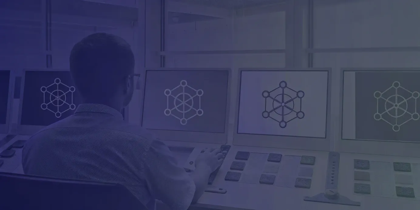 An engineer using a GitOps architecture to manage multiple clusters on monitors.
