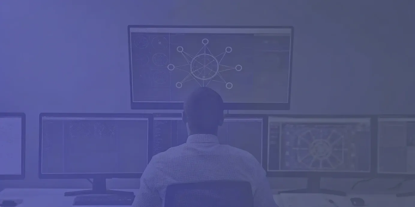 Kubernetes compliance tools displayed on monitors.
