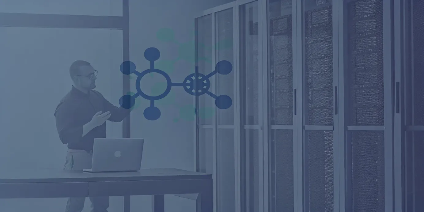 A person safely running the kubectl delete nodes command on a laptop in a server room.